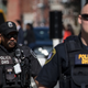 DHS police accompanying Amalija Knavs, the mother of first lady Melania Trump, as she arrived at the U.S. Citizenship and Immigration Services building in New York in May 2018.